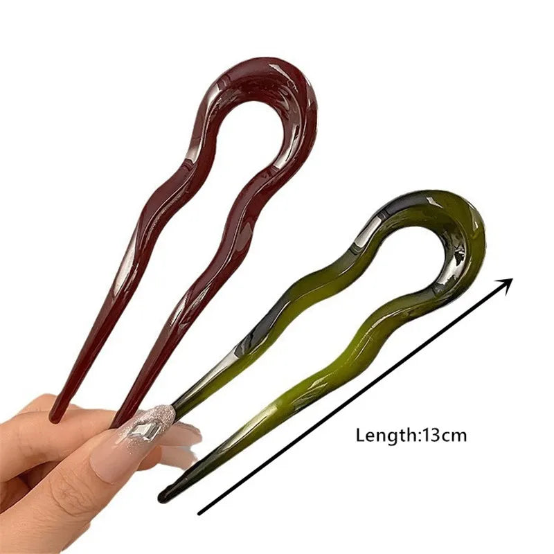 Burgundy and olive green French hair pins beside an arrow labeled Length: 13cm