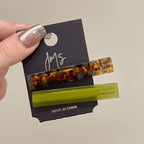 Geometric side hair clips, set of 2, in tortoise pattern and olive green