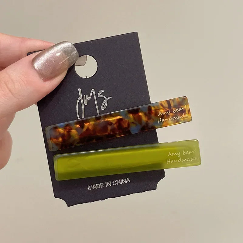 Geometric side hair clips, set of 2, in tortoise pattern and olive green