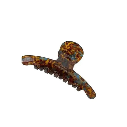 Tortoiseshell-pattern claw clip on a white background