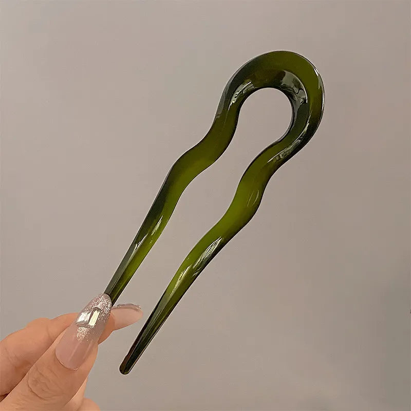 Olive green French hair pin held between two fingers; the Duo includes 2 in this color